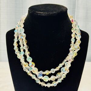 Aurora borealis necklace 52 inches with graduating beads Excellent Condition